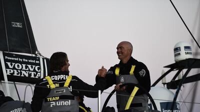 Team Brunel skipper Bouwe Bekking, right, celebrates as his boat wins Leg 7 of the Volvo Ocean Race on Wednesday. Ricardo Pinto / Volvo Ocean Race / May 27, 2015