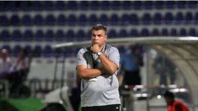 AL AIN , UNITED ARAB EMIRATES - Oct 14 : Cosmin Olaroiu , Coach of Al Ain during the Etisalat Cup round 3 football match between Al Wahda vs Al Ain at Tahnoun Bin Mohammed Stadium in Al Ain. ( Pawan Singh / The National )