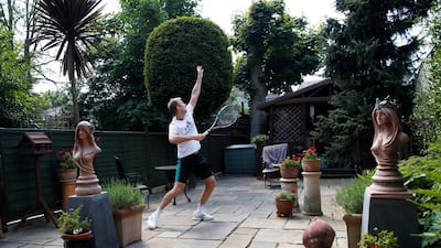 British tennis player Dominic Inglot during a training session in his garden in Chiswick. Reuters