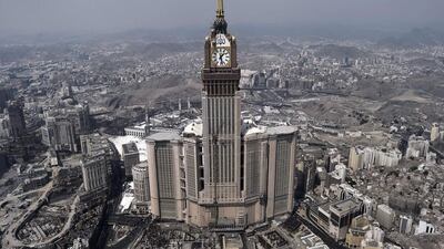 The clock of the Abraj Al-Bait Towers in the holy city of Mecca. MOHAMMED AL-SHAIKH / AFP