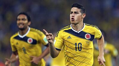 James Rodriguez celebrates his opening 1-0 goal against Uruguay on Saturday in their last-16 match at the 2014 World Cup in Rio de Janeiro, Brazil. Antonio Lacerda / EPA