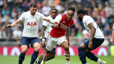Arsenal's Pierre-Emerick Aubameyang in action with Tottenham Hotspur's Japhet Tanganga and Pierre-Emile Hojbjerg.