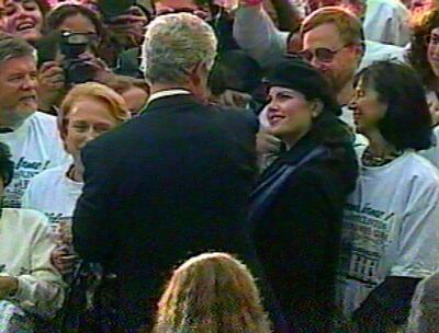 In this image taken from video, Monica Lewinsky watches President Clinton as he greets White House staff members in 1996. AP
