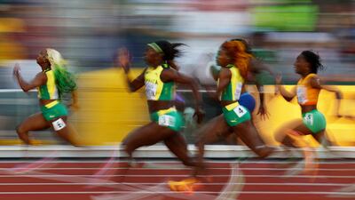 Shelly-Ann Fraser-Pryce, Shericka Jackson and Elaine Thompson-Herah during the women's 100m final. Reuters