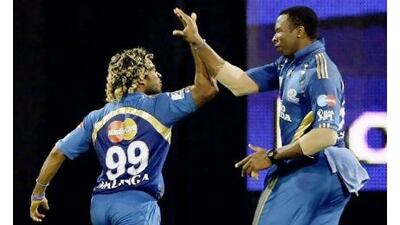 Lasith Malinga, left, and Kieron Pollard were among the form men for Mumbai last night.