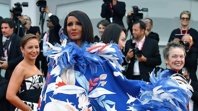 Iman wears Valentino as she arrives for the opening ceremony and screening of 'La Verite' at the 76th annual Venice International Film Festival, on Friday August 28. EPA