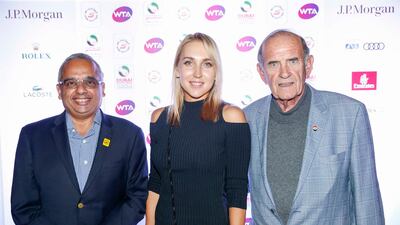 Ramesh Cidambi and Colm McLoughlin with Elena Vesnina, cente, at the WTA Dubai Duty Free Tennis Championships' Players' Party. Courtesy Dubai Duty Free Tennis Championships