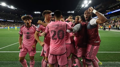 Luis Suarez is mobbed by his Inter Miami teammates after scoring. Getty Images