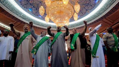 Worshippers utter religious chants at the Abdul Qadir Gilani Mosque in Baghdad, Iraq. AFP