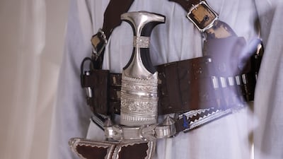 Traditional khanjar (dagger) with a scabbard and belt