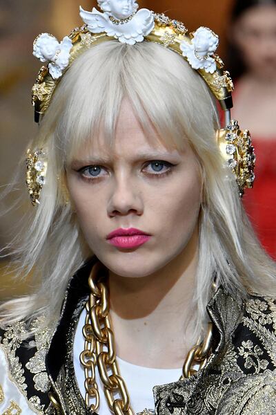 Ear plugs are a must, but make them fashion, like these bedazzled ones from the Dolce & Gabbana autumn / winter 2018-2019 show. Getty Images