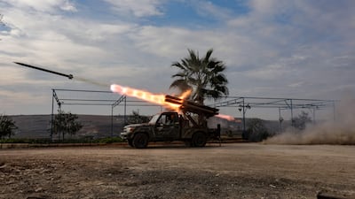 A multi-barrel rocket launcher fires at regime troops, in the northern outskirts of Syria's west-central city of Hama. AFP