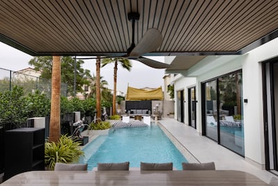 The property was fully renovated with a large swimming pool in the garden. Antonie Robertson / The National