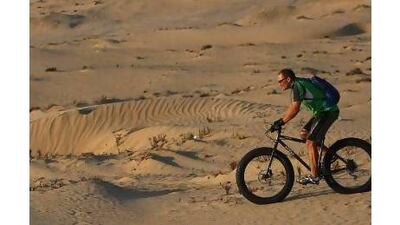 A reader likes Ian Ganderton's dune-busting bicycle and would like to see bikes on city roads.Satish Kumar / The National