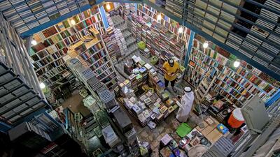 Iraqis visit the book market of Al Huaish, in the central city of Najaf. AFP