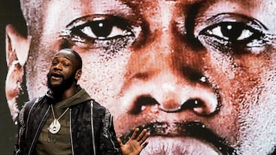 Deontay Wilder arrives on stage. EPA