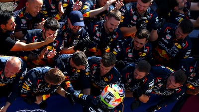Race winner Max Verstappen celebrates with his Red Bull team. Getty