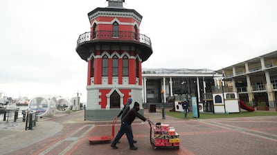 Workers prepare to reopen restaurants in Cape Town. South Africa executed one of the world's strictest Covid-19 lockdowns. Reuters