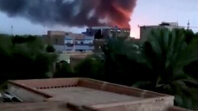 Smoke from a fire near a military complex containing an arms factory in southern Khartoum, Sudan. Reuters