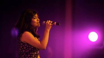 Malvika performing in the AUD Idol finale at American University of Dubai.