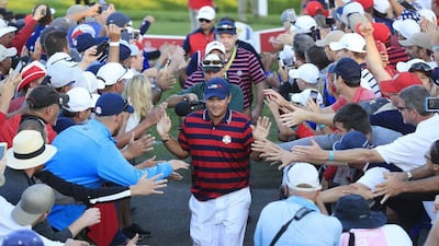 Patrick Reed of the US celebrates with fans after the afternoon Fourball matches during the Ryder Cup 2016 at the Hazeltine National Golf Club in Chaska, Minnesota, USA, 01 October 2016. Tannen Maury / EPA
