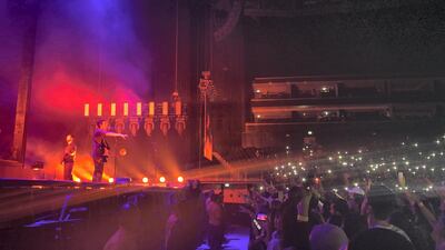 The crowd in Dubai light up their phones as The 1975 perform One More Time. Sophie Prideaux / The National