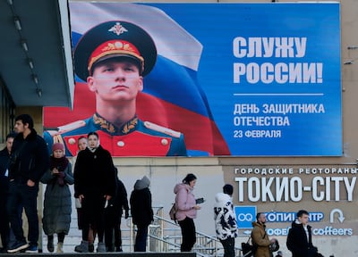 A Russian recruitment poster in St Petersburg. EPA
