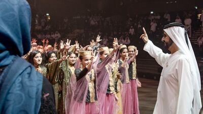 Sheikh Mohammed waves at children during their performance at Le Perle in Dubai. Courtesy: Dubai Media Office