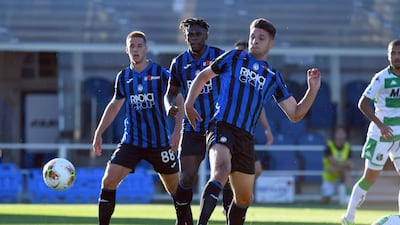 Berat Djimsiti of Atalanta scores the opening goal against Sassuolo. Getty
