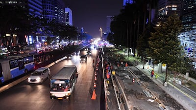 Indonesian labourers working on construction along Sudirman Street in Jakarta, ahead of the 2018 Asian Games. AFP