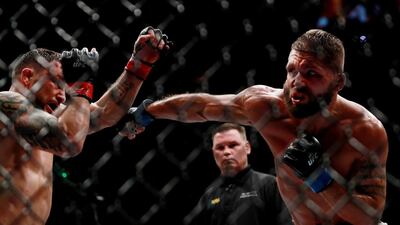 Jeremy Stephens of the United States, right, fights against Frankie Edgar of the United States in their featherweight bout. Edgar won by a unanimous decision. Michael Reaves / Getty Images