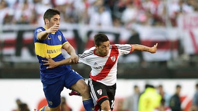 Midfielder Manuel Lanzini, right, will be the youngest foreign player to ever join the Arabian Gulf League when he dressses for Al Jazira. Juan Mabromata / AFP