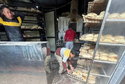 Employees readying bread for sale at a bakery in Maadi, a suburb of Cairo, Egypt. REUTERS