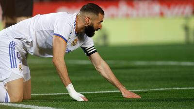 Real Madrid's French forward Karim Benzema reacts during the Spanish League football match between RCD Mallorca and Real Madrid CF at the Son Moix stadium in Palma de Mallorca on March 14, 2022. (Photo by JAIME REINA / AFP)