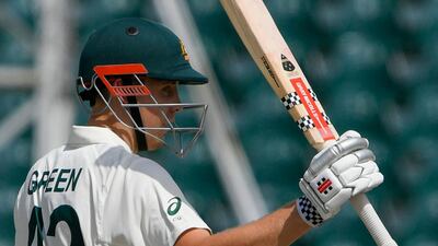 Australia's Cameron Green celebrates after reaching his half-century. AFP