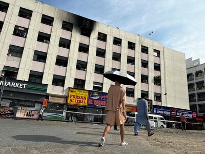 Sixteen people died and nine others were injured in an apartment building fire in Deira on Saturday. Photo: Reuters