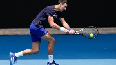 Serbia's Novak Djokovic practices on Rod Laver Arena. AP Photo