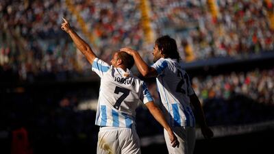 Malaga's Joaquin Sanchez, left, celebrates with teammate Sergio Sanchez after scoring a goal against Levante at La Rosaleda stadium in Malaga, Spain. Jon Nazca / Reuters