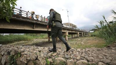 A Colombian police officer guards the border with Venezuela in La Parada, near Cucuta, Colombia, February 19, 2019. AP
