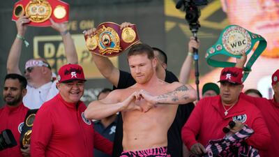 Sauk Alvarez motions to the crowd during the weigh-in for his fight with Dmitry Bivol. AP