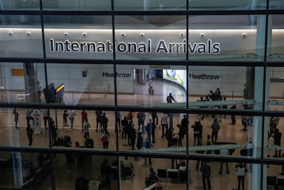 Travellers arrive at Heathrow Airport. Getty Images
