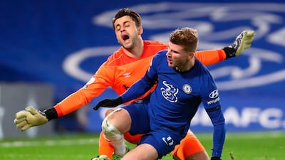 Timo Werner tackles and injures goalkeeper Lukasz Fabianski during the Premier League match between Chelsea and West Ham United at Stamford Bridge. EPA