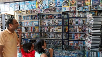 The Blue Diamond video store in Madinat Zayed shopping centre has so far survived competition from big companies like Netflix. Chris Whiteoak / The National