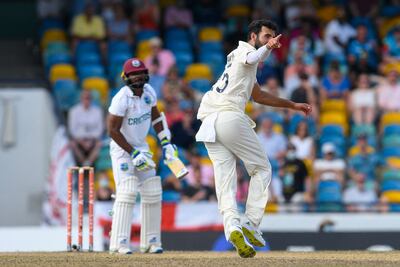 Saqib Mahmood celebrates the dismissal of Veerasammy Permaul. AFP