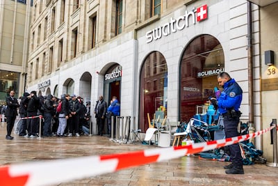 Security staff and police had to control crowds at various Swatch stores around the world on launch day. EPA