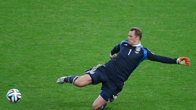 Germany goalkeeper Manuel Neuer leaves his box to make a lunging kick-save against Algeria in their 2-1 victory on Monday at the 2014 World Cup round of 16. Clive Rose / Getty Images / June 30, 2014