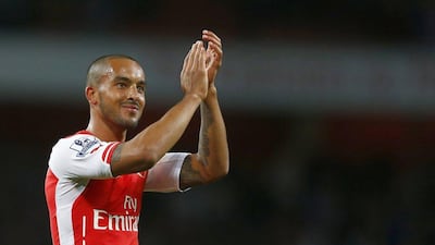 Arsenal's Theo Walcott applauds the fans after his side's 3-0 Premier League victory over Burnley on Saturday at the Emirates Stadium. Andrew Winning / Reuters / November 1, 2014