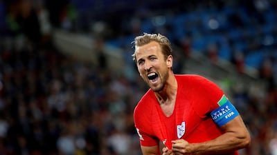 England captain Harry Kane celebrates after converting a penalty. Alberto Estevez / EPA