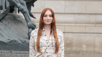 Sophie Turner arrives at the Louis Vuitton show. AP