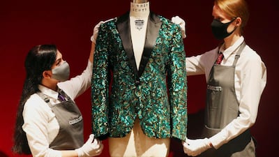 The L'Wren Scott online auction runs until July 1 and the Mick Jagger jackets are set to fetch upwards of £20,000. Jonathan Brady/PA via AP